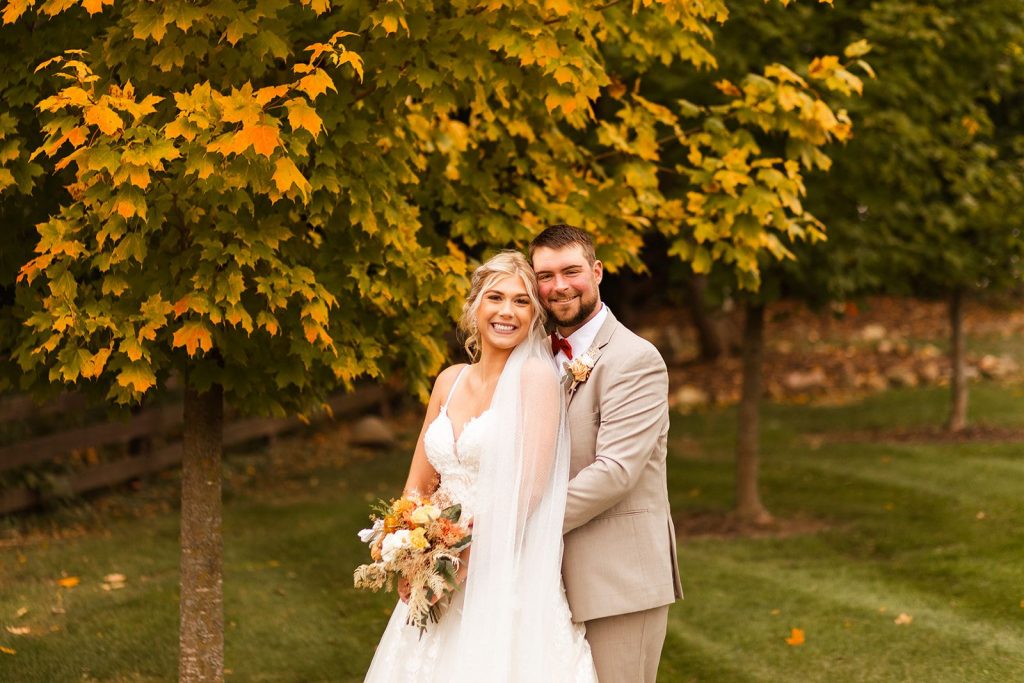 Wisconsin fall wedding bride and groom