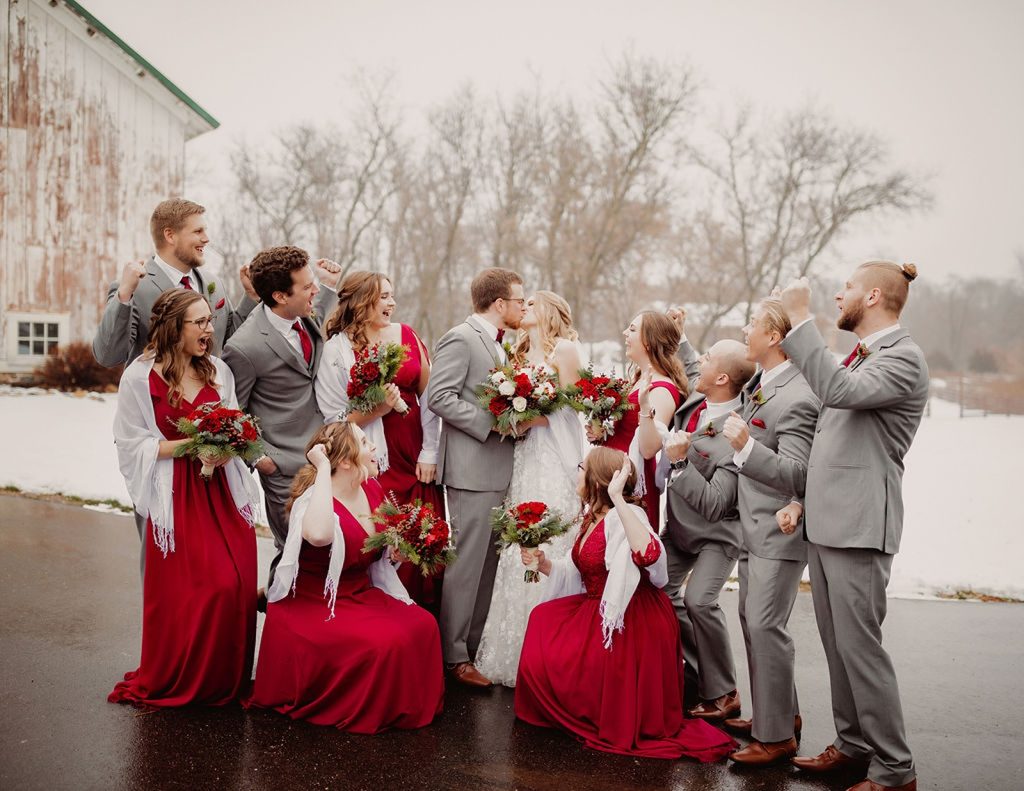 wedding party outside winter wedding venue in Wisconsin
